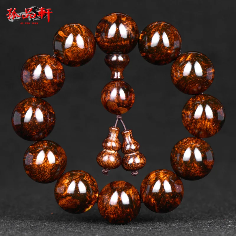 

Top Hainan yellow pear black oil pear solitary product hand string spider grain tiger skin grain mountain water grain Buddhabead