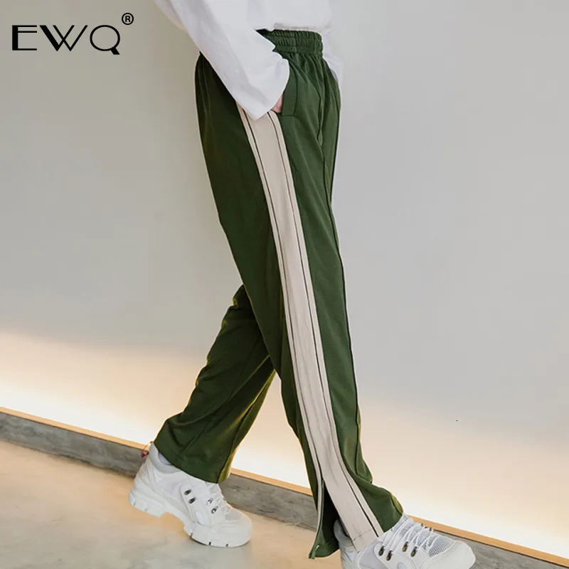 

EWQ / 2020 Spring New Fashion Split Black Trousers Men Loose Casual Straight Mid Waist Korean Elastic Waist Pants Tide 9A073