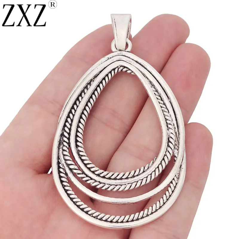 

ZXZ 2pcs Tibetan Silver Large Open Hollow Oval Charms Pendants for Necklace Jewelry Making Findings 84x46mm