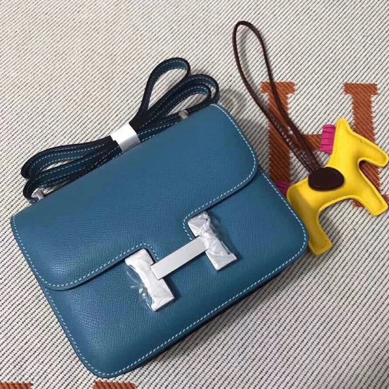 

Air hoste Kang Kang small square bag two-layer leather palm pattern microfiber inner one shoulder Messenger bag