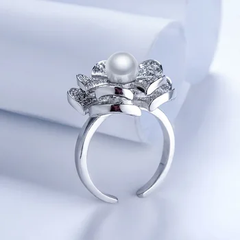 

European and American luxury high-end fashion flower rotating ring 11mm big black Tahiti pearl pendant women Christmas gift exqu