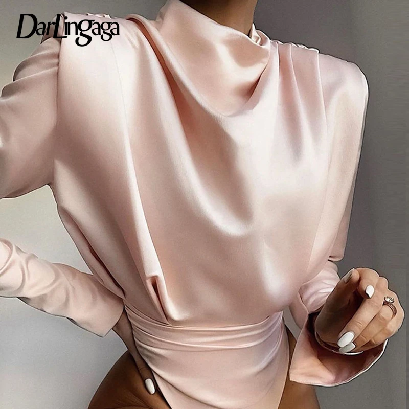 

Darlingaga Fashion Backless Satin Pink Long Sleeve Bodysuit Women Mock Neck Ruched Body 2020 Spring Bodysuits Party Jumpsuit New