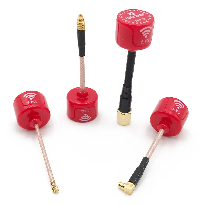 Gros plan sur l'antenne FPV 5.8GHz RHCP court rouge RP-SMA montrant sa texture et sa couleur vive.
