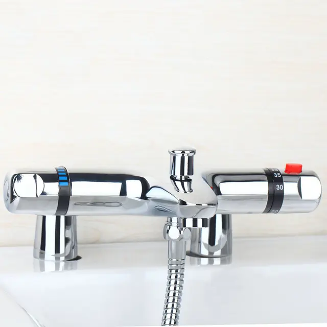 ทองเหลืองดาดฟ้าติดตั้งวาล์วผสม Thermostatic อุณหภูมิคงที่ควบคุมสองอ่างอาบน้ําก๊อกน้ําแตะเทอร์โมวาล์ว TR533 3