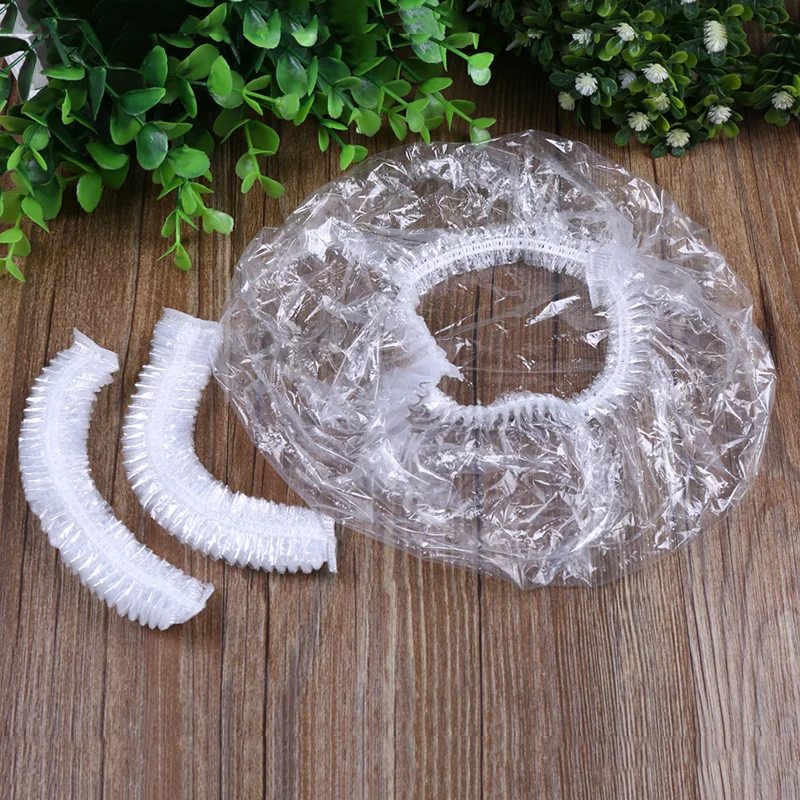 

100PCs/Set Potable Disposable Transparent Shower Caps Waterproof Elastic Shower Hair Cap Bathing Salon Hat Bathroom Accessories