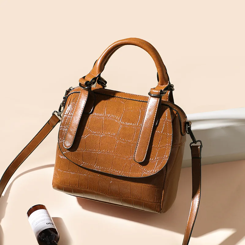 

New Fashion Lychee Pattern Female Shell Shoulder Slung Simple Head Handbag