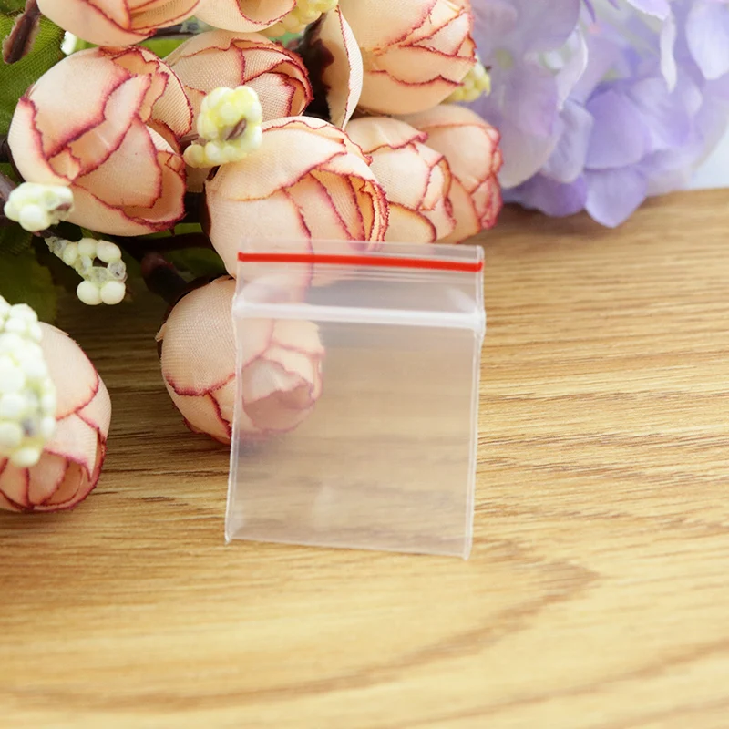 

Free Shipping 300pcs/lot (2cm*3cm) Clear Resealable Plastic Bag Ziplock Packaging Bags PE Zip Lock Bags thickness:0.2mm