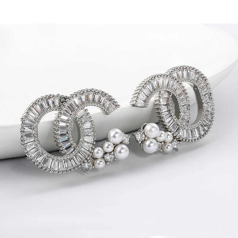 

Classic light luxury earrings with trendy letters inlay in A zircon with A dazzling pearl statement for women