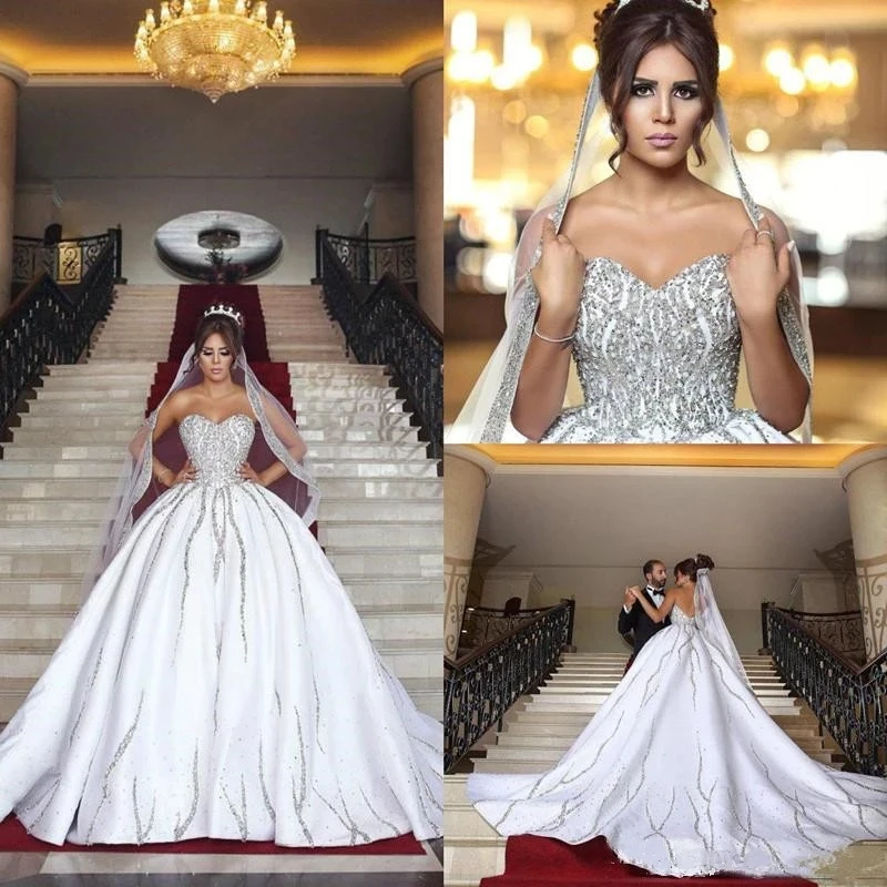 

Nigerian Dubai Arabic Ball Gown Bling Beading Sequins Wedding Dresses Plus Size Sweetheart Backless Sweep Train Bridal