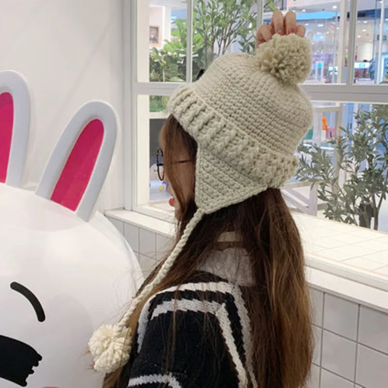 

Korean version of lovely Lei Feng hat and women's ball wool cap in autumn and winter
