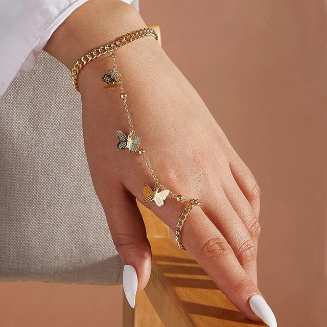 Amazon.com: Obmyec Pearl Finger Ring Bracelets Gold Pearl Hand Chain Slave  Beaded Hand Harness Chain Wedding Bridal Hand Accessories for Women and  Girls: Clothing, Shoes & Jewelry