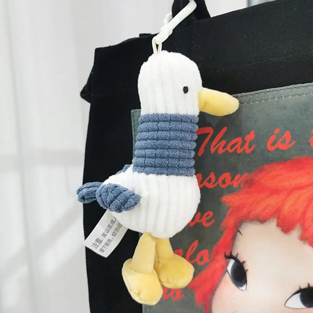 Pequeño peluche llavero con forma de pato de dibujos animados para niños, llavero suave, colgantes de bolso de dijes, coche, novedad