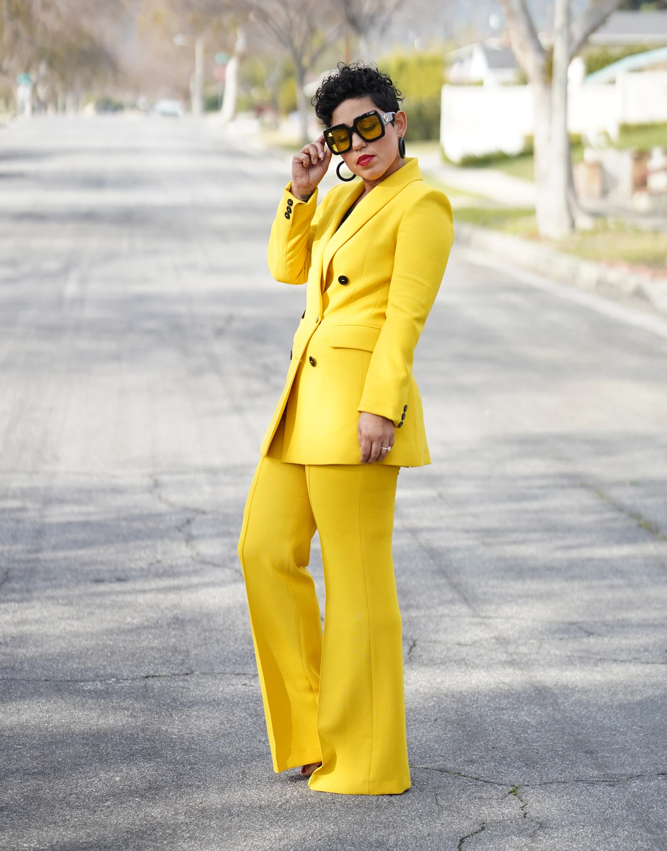Fashion Pretty Young Woman In Yellow Suit Clothes With Handbag Stock Photo  - Download Image Now - iStock
