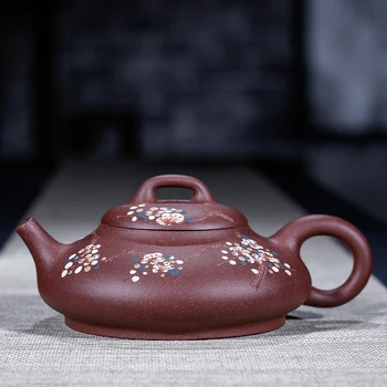 

Yixing recommended manual undressed ore purple mud flat 250 ml plum flower tea