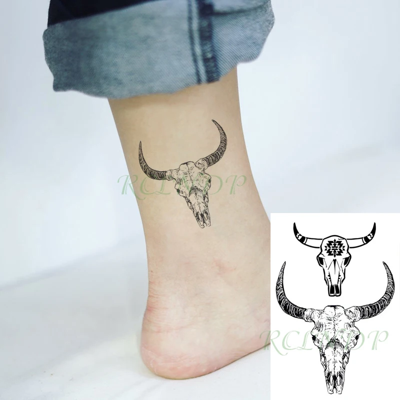 Premium Vector | Goat skull tattoo hand drawn illustration