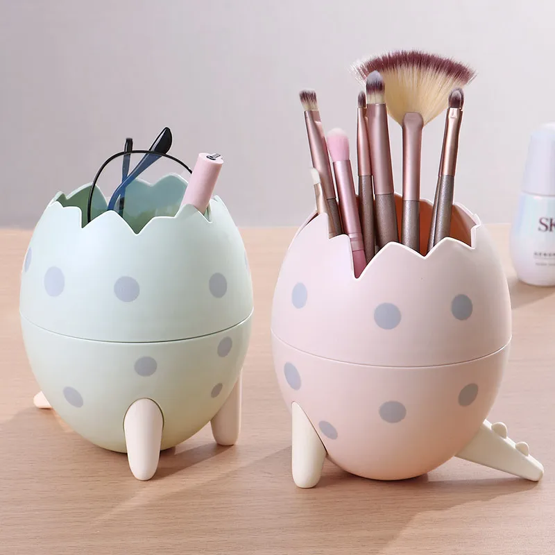 

1pcs Creative Makeup Brush Storage Container Dinosaur Egg Tripod Desktop Storage Box Dinosaur Egg Pen Holder In Stock Dropship