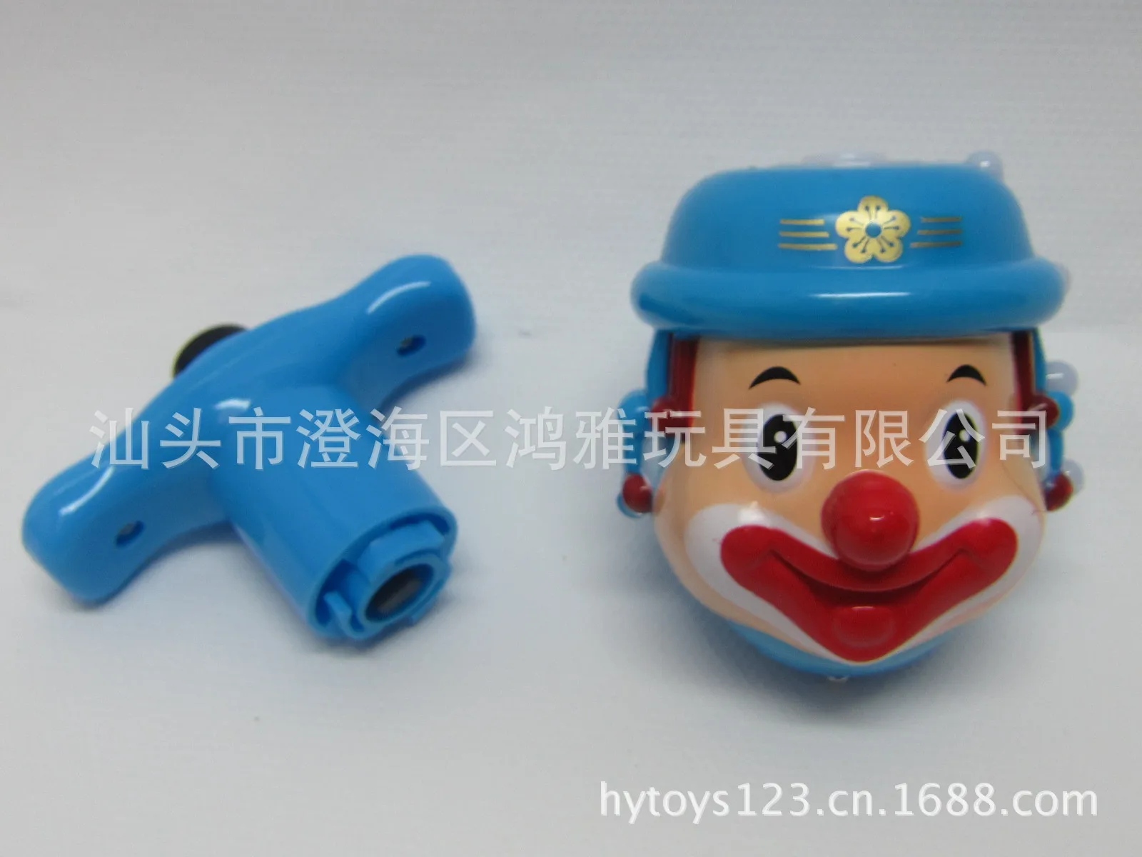 Manufacturers Direct Selling CHILDREN'S Plastic Toys Light Plastic Gyro Music Spinner Clown Spinner Hot Selling Cross Border