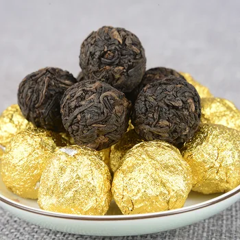 

Wholesale Yunnan Pu'er Tea Ban Zhang Jin Ya (Jin Xi) Cooked Tea Dragon Ball Court Tuo Tea Tea in Bulk 500G