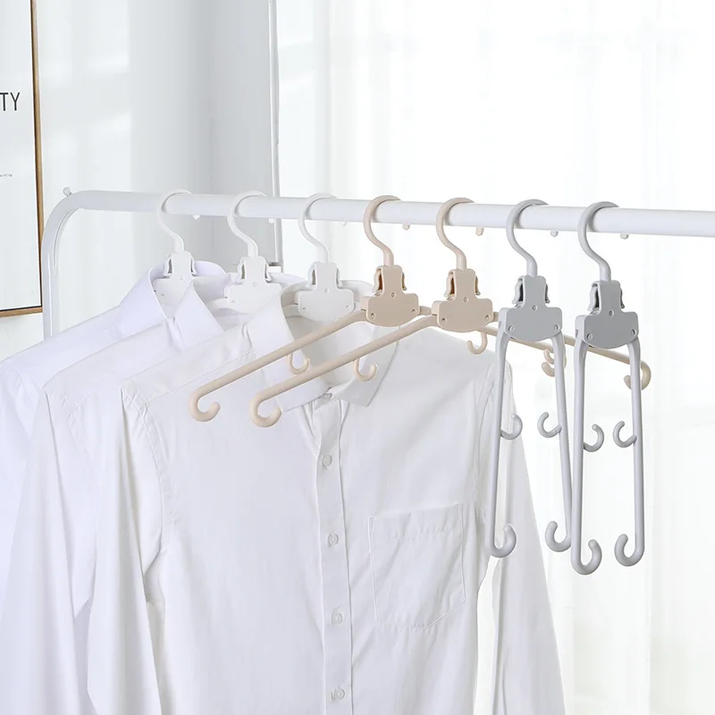 

Mini Travel Folding Hangers Telescopic Portable Clothes Drying Rack Scarf Wardrobe Organizer Space Saving Folding Magic Hanger