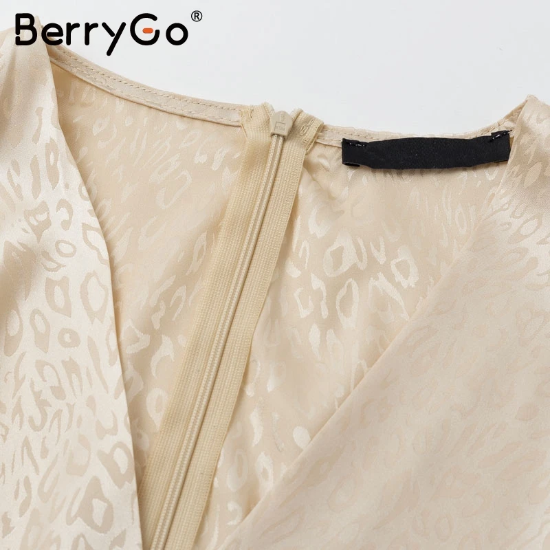 BerryGo Sexy Autumn winter puff sleeve sash belt female blouses shirts Sexy v-neck printed women blouse Elegant party ladies top