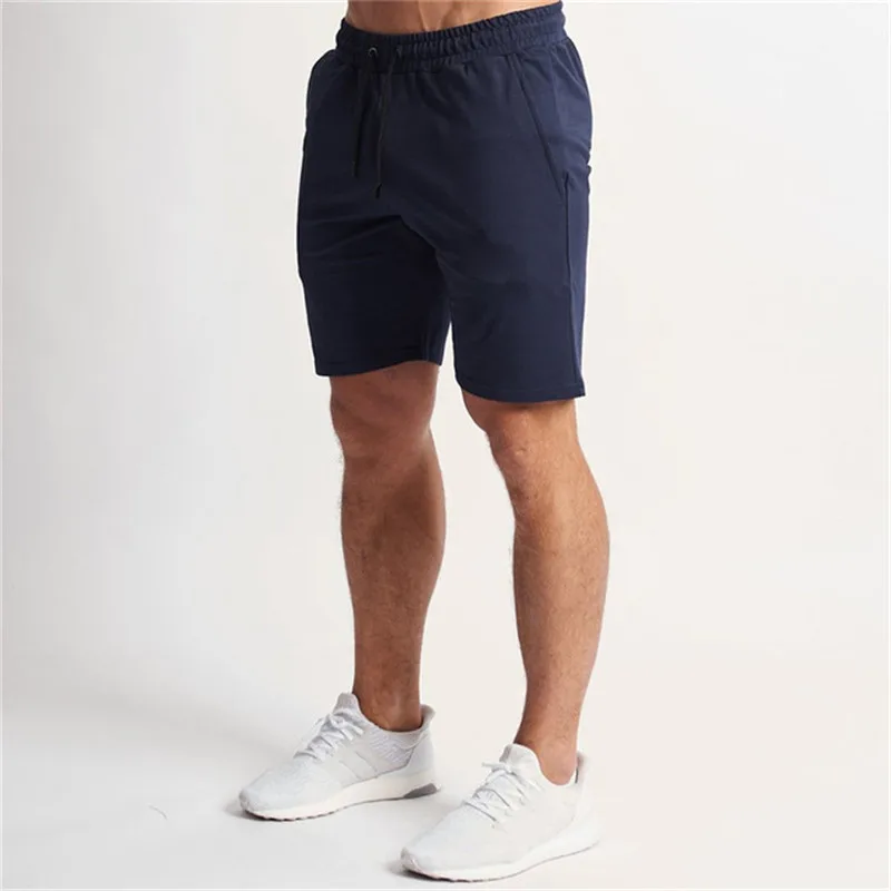 

2020 new men's tight summer shorts with short calf length, suitable for fitness and leisure, sports pants running beach shorts