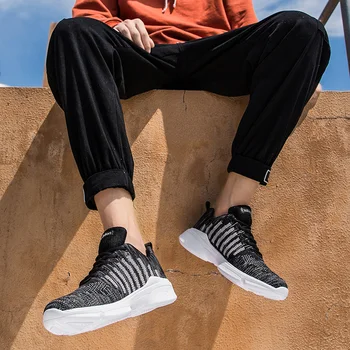 

2019 spring and autumn fashion new breathable large size flying woven men's running shoes sneakers