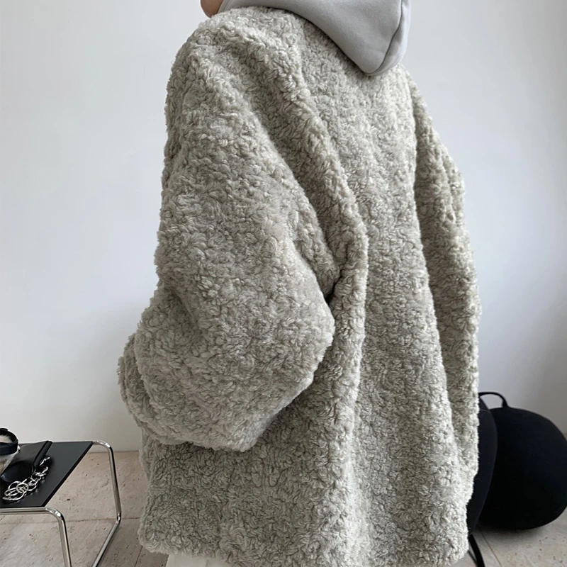 Winter women\'s casual solid color V-neck long-sleeved loose lamb wool coat