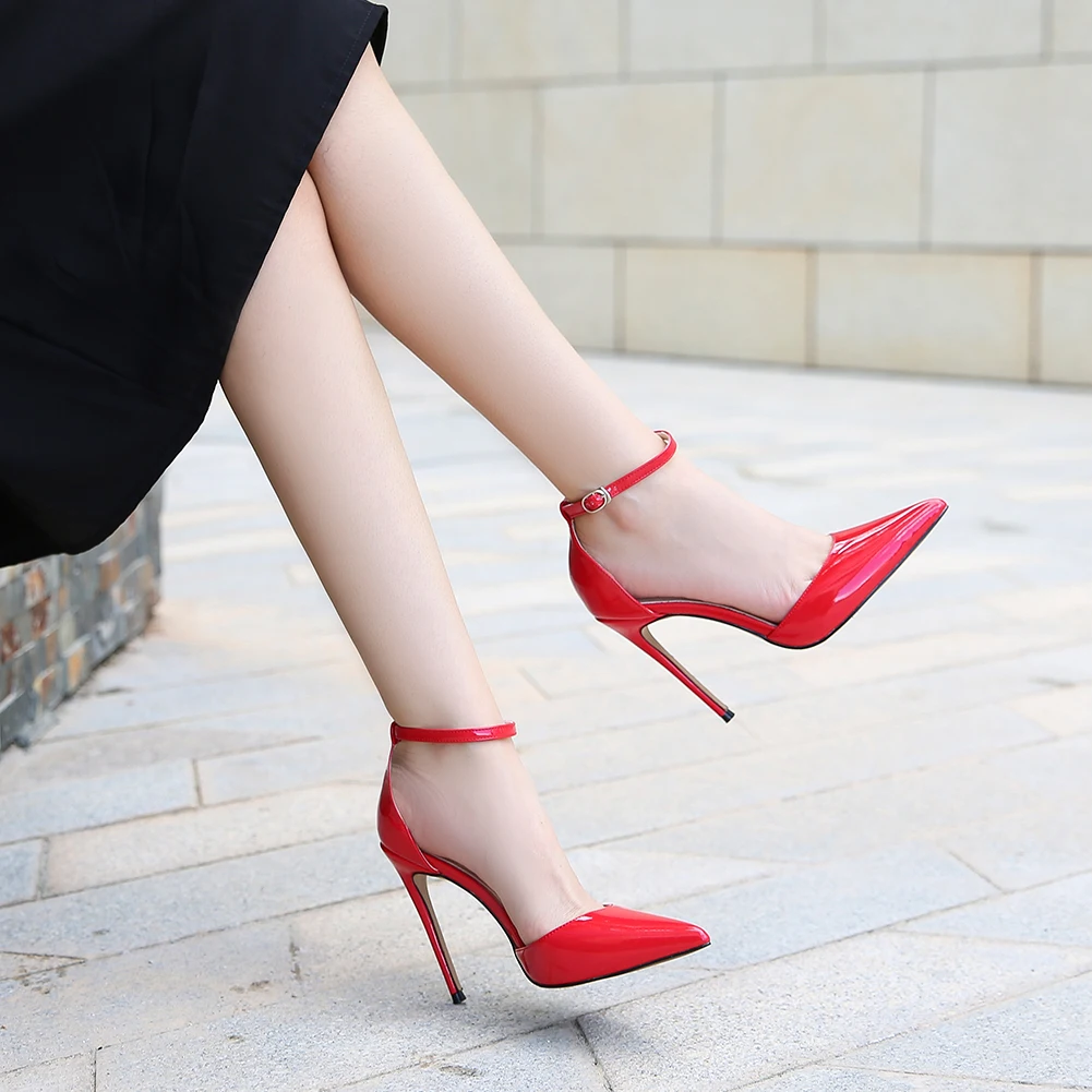 Womens sexy legs. Woman buttons her high heel shoes. Beautiful woman legs  wearing dress with high heel shoes. Concept shoes, women's outfits, the  problem of choice. Stock Photo | Adobe Stock