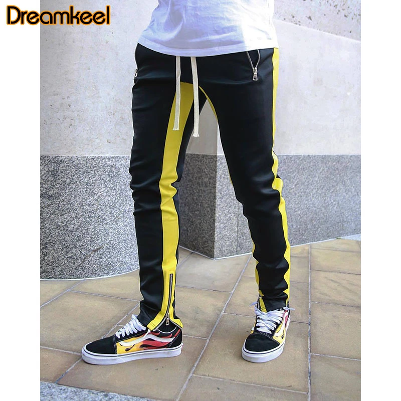 yellow tracksuit bottoms mens