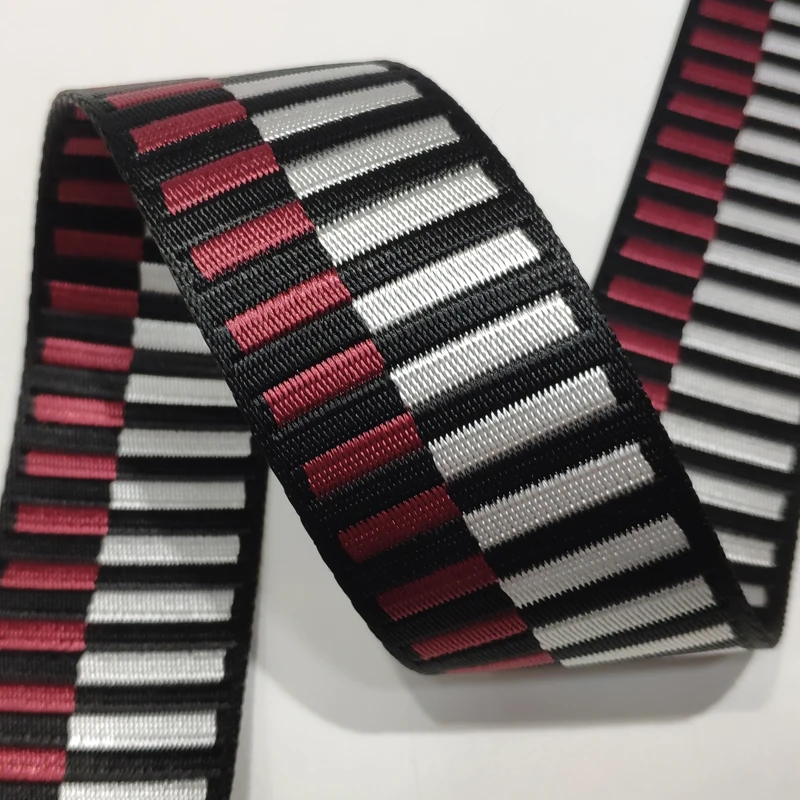 

Высококачественная 2-Дюймовая жаккардовая полиэфирная ткань с рисунком 50 мм ТРАПЕЦИЕВИДНОЕ плетение белый/красный/черный цвет