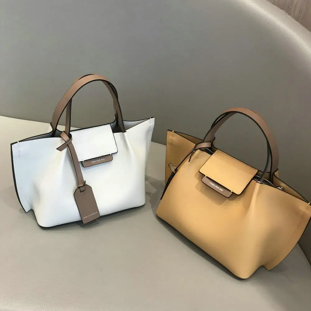 

2020 spring new female bag pure color large capacity simple fashion portable shoulder bag messenger bag handbag female bag