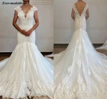 

Backless Mermaid Wedding Dresses 2019 Lace Appliques Beaded Cap Sleeves Elegant Bridal Gowns Bride Dress Vestido De Noiva