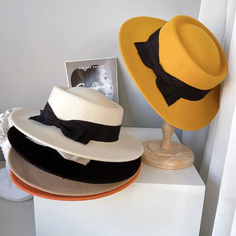 

New High Quality Wool Winter Classic Bowknot Concave Top Bowler Hat Fedoras Cap Women Leisure Panama Jazz Felt Hat Bone Feminino