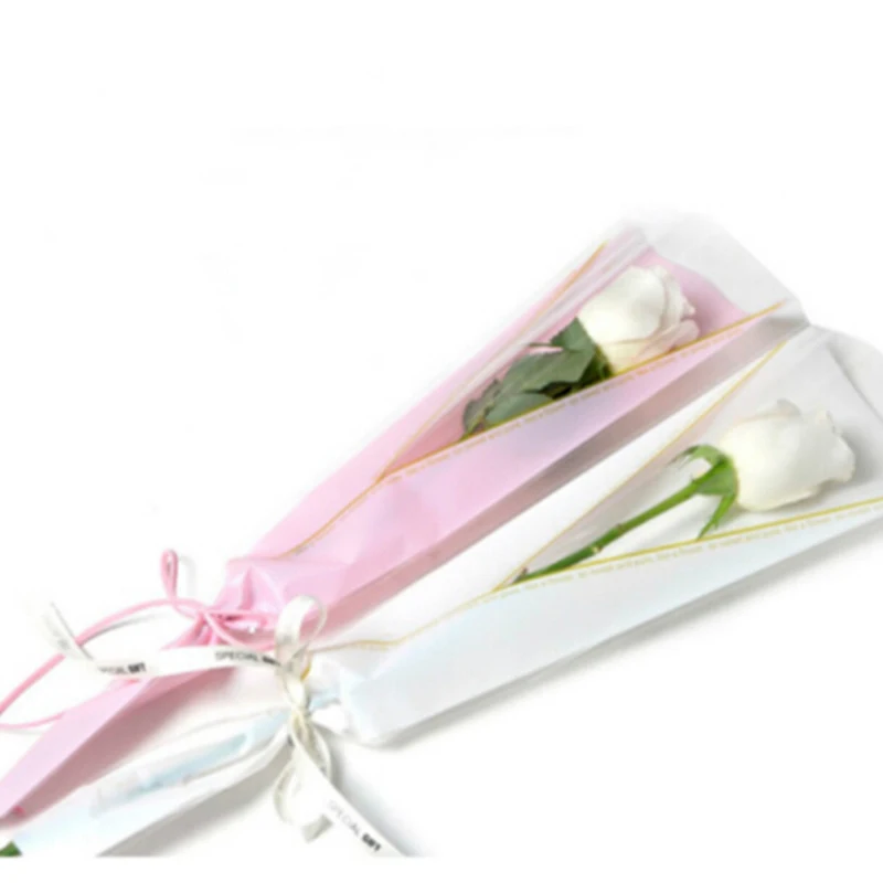 Как завернуть тюльпаны в прозрачную пленку. Красивая упаковка для цветов. Как завернуть тюльпаны в прозрачную пленку. Упаковка одного цветка. Красиво упаковать тюльпаны в пленку.