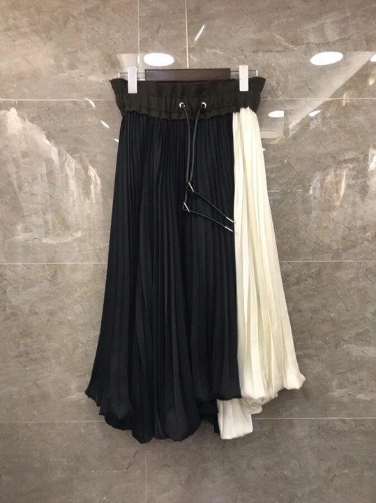 

2019 autumn and winter new women's drawstring wild color matching half skirt