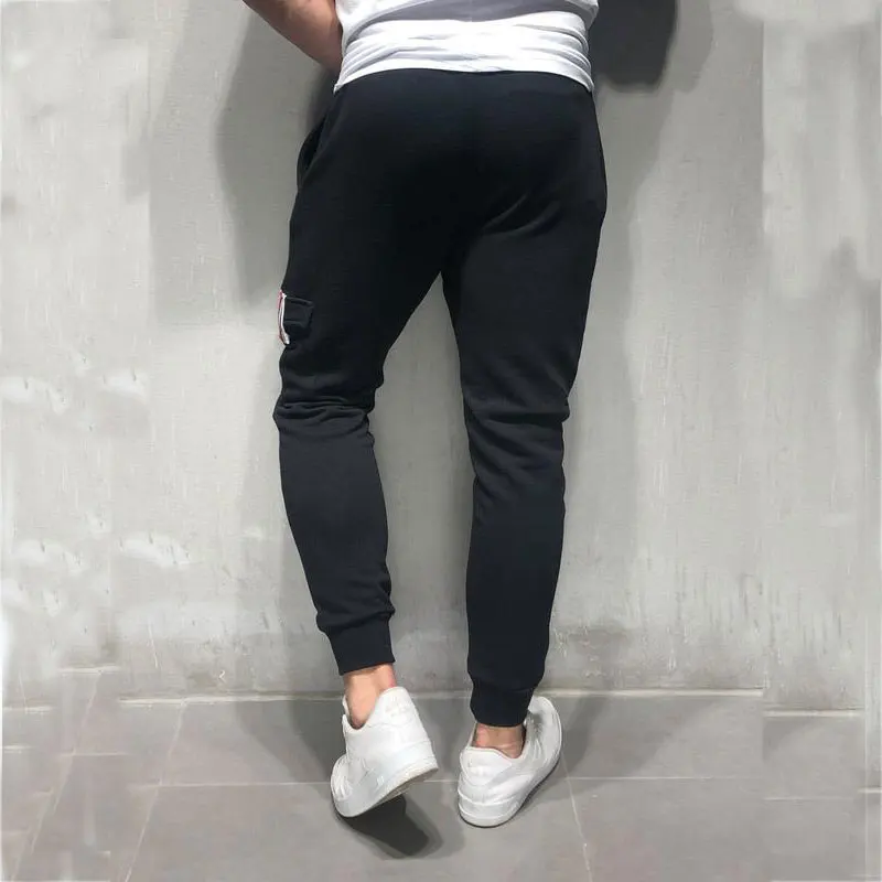 Мужские хлопковые повседневные узкие брюки большого размера, модные штаны для бега, черные спортивные штаны, Корейская мужская одежда M-3XL
