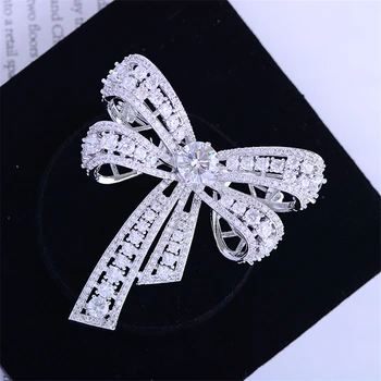 

Simple Large Silver Color Hollow Bowknot Brooches for Women Luxury AAA Zirconia Brooch Pin Female Coat Suit Broche Jewelry