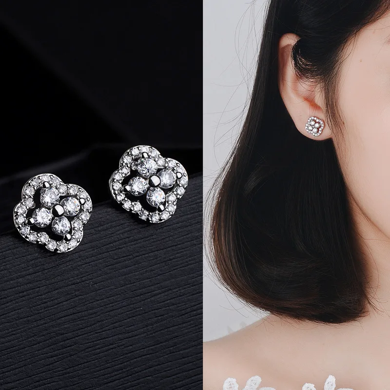 

Coniferous Tetrafolium Ear Nails Female Korean Zircon Simple Temperament Baitao Flower Earrings Factory Wholesale