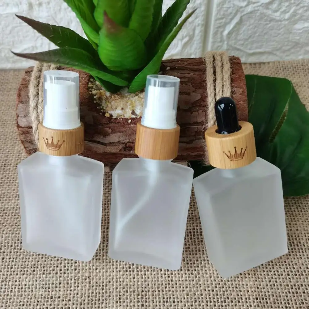 

Natural bamboo dropper lid Eco friendly 30ml 1oz hair oil clear matte cosmetic rectangular glass dropper bottle square engraving