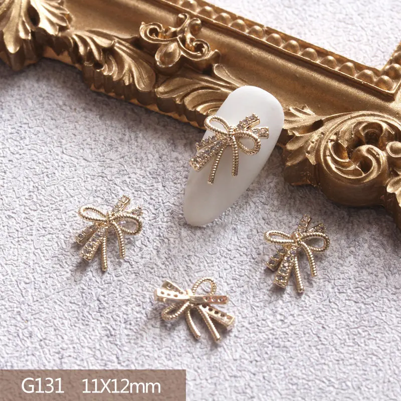 10 개/몫 3D 활 나비 사랑 합금 네일 아트 지 르 콘 진주 금속 매니큐어 손톱 Accesorios 용품 DIY 네일 장식 매력