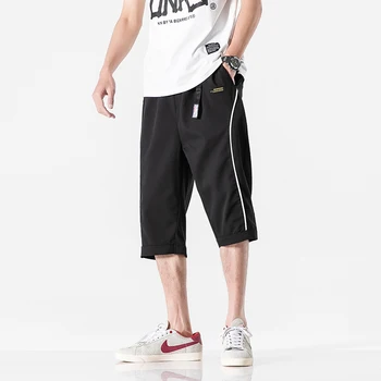 

Men's Casual Calf Length Pants Summer Designer Solid Color Plus Size Slim Hip Hop Harem Pant Men Loose Sweat Pants Streetwear