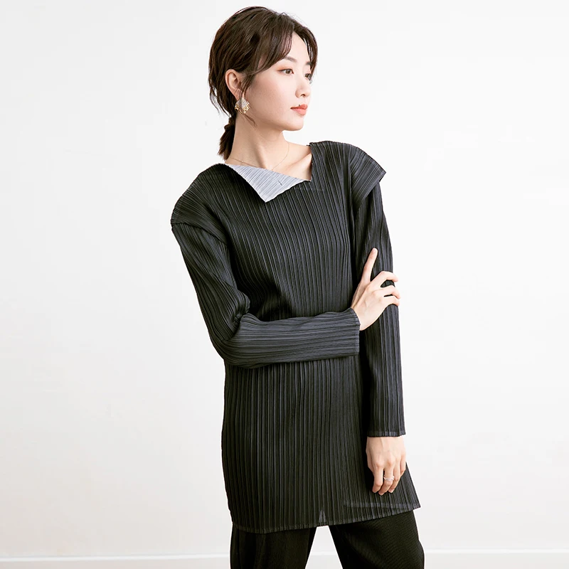 

Ruffled long sleeve elastic new style thicker style Miyake small crowd design sense T-shirt free shipping