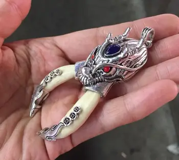 

China Teeth of wolves Tibetan silver dragon tooth Pendant decorate Statue