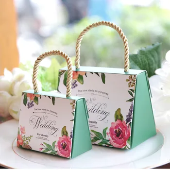 

50pcs Romantic Wedding candy box paper chocolate handbag Wedding Favors and Gift Boxes Bomboniera Giveaways Boxes Party Supplies