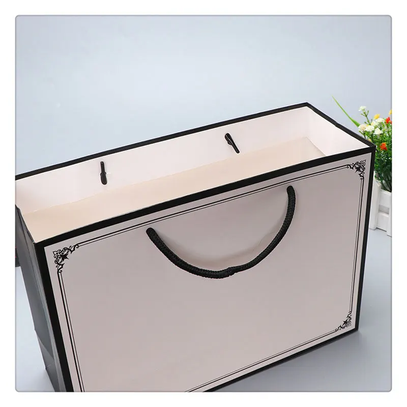 5pcs 2021 Wholesale Coated white cardboard Paper Bag Shopping Gift Bag Custom Logo Paper Clothing Handbag Gift Storage Bag