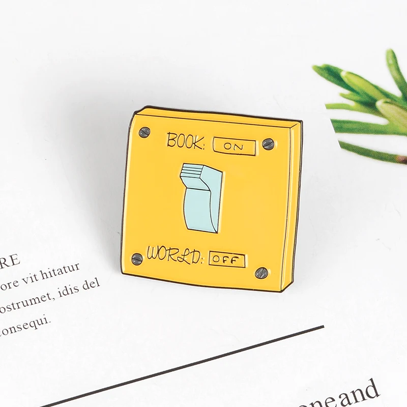 

Funny Book Switch Enamel pin Yellow Power Switch Turn off / on Books Brooch Custom Badges Lapel Pins Jewelry Gift for Friends