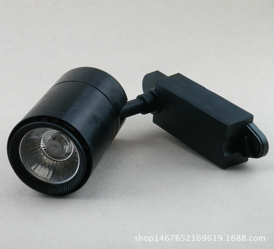 Светодиодный высококачественный черный и белый с рисунком COB отслеживание света цилиндр высокой проницаемости направляющий рельсовый прожектор выставочный зал Showca