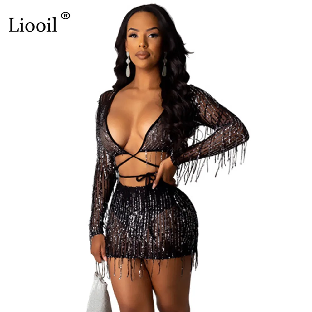 

Liooil Black Mesh Sheer Two Piece Outfits Sexy Sequin Mini Dress With Tassel Long Sleeve V Neck Party Night Club Tight Dresses