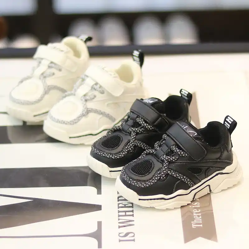 white infant tennis shoes
