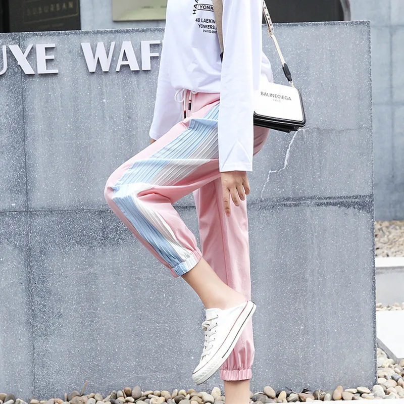 

Explosion hot 2019 autumn and winter women's pants new color matching casual large size waist loose tie small feet trousers